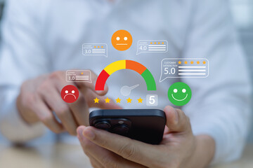 Online customer satisfaction survey concept, businessman checks customer rating service from...