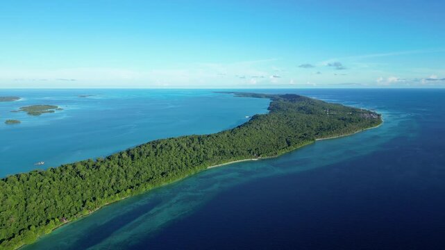 Maratua, Indonesia: Aerial drone footage of Maratua island with its turquoise lagoon in the Derawan archipelago in Kalimantan in Indonesian Borneo. 