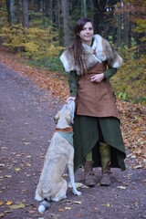 Fototapeta premium Schildmaid und Hund 