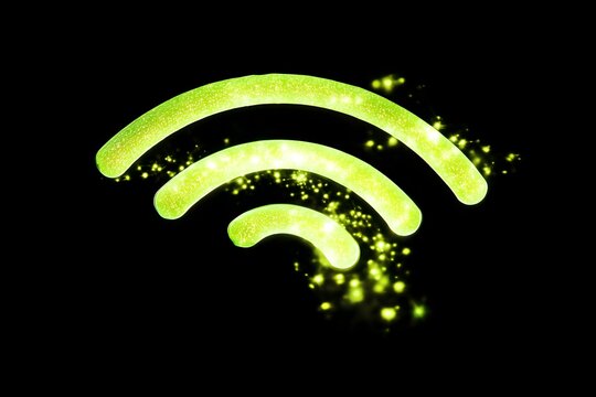 Vibrant lime green WiFi logo shimmering with stardust and glitter effects, a futuristic concept for global connectivity and network communication technology on a black background