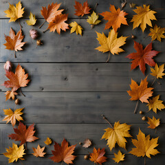 autumn leaves on wooden background