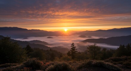 Obraz premium Sunrise Over Mountains and Fog