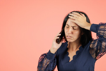 Young woman upset about the conversation she's having on her cell phone. An entrepreneur is worried and angry because the meeting with the client didn't go well.