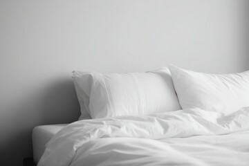 minimalistic image of peaceful bedroom scene focusing on unoccupied bed suggesting tranquility and rest