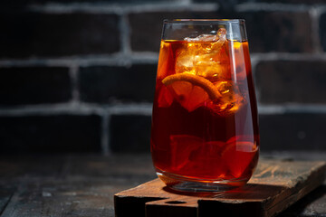 glass of fresh iced tea with lemon, closeup