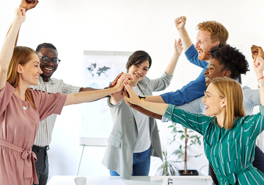 business meeting businesswoman woman office teamwork togetherness unity hand partnership holding entrepreneur celebrating success victory win happy smiling startup diversity student