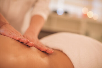 Young woman enjoying masage