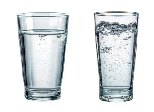 Clear water and sparkling water in glass cups on white surface