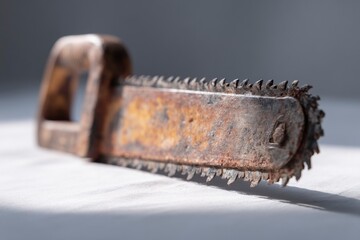 Rusty Hand Saw: A Close-Up Study in Weathered Texture