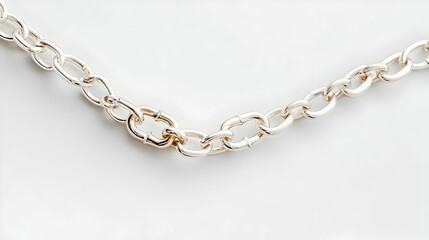 Obraz premium Closeup Textured Silver Chain Necklace On White Background