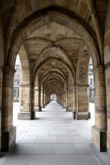 Fototapeta premium Panorama showcasing the depth and perspective of Glasgow University's cloister walkway - perspective angle gothic