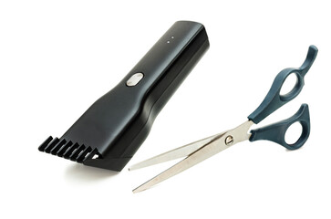 Hair Trimmer and Scissors on White Background