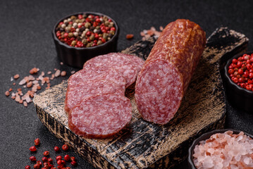 Sliced salami sausage, smoked meat, delicious deli snacks