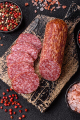 Sliced salami sausage, smoked meat, delicious deli snacks