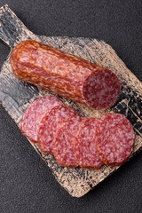 Sliced salami sausage, smoked meat, delicious deli snacks