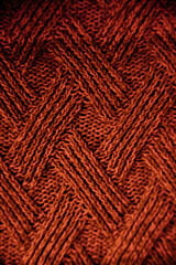 The soft and cozy texture of the knitted product. Hand or machine knitting, needlework, sweaters, knitwear.