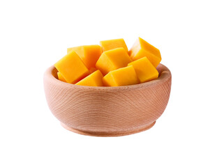 cheddar cheese sliced ​​into cubes in a wooden bowl isolated on a white background.