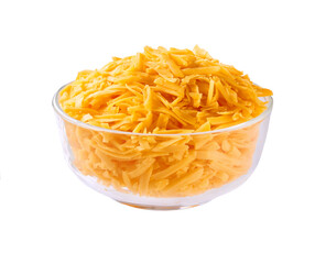 grated cheddar cheese in a clear glass bowl isolated on a white background.