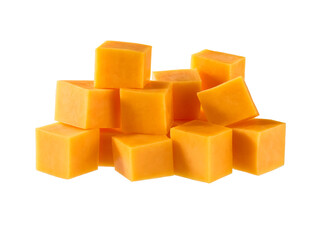 Cubes of cheddar cheese isolated on a white background.