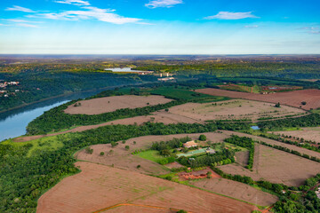 An aerial view captures the landscape surrounding the Buddhist Temple of Foz do Iguaçu in the Triple Frontier region, where Brazil, Paraguay, and Argentina meet.