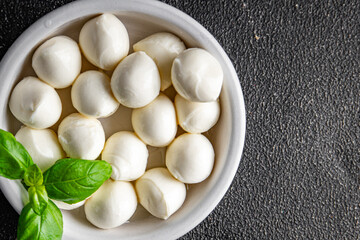 Mozzarella mini cheese balls dish fresh delicious gourmet food background on the table rustic food top view copy space