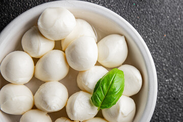 Mozzarella mini cheese balls dish fresh delicious gourmet food background on the table rustic food top view copy space