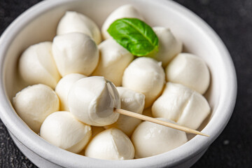 Mozzarella mini cheese balls dish fresh delicious gourmet food background on the table rustic food top view copy space