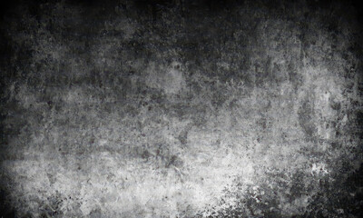 Fototapeta premium A classic black and white photograph of a worn-out brick wall with texture and cracks