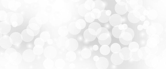 Beautiful light grey soap bubbles float as background. Dreamy soft focus wallpaper backdrop. Light grey diffuse glowing floating holiday circle dots pattern. 3d rendering.	