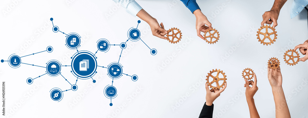 Aufkleber a modern workspace showcases hands holding gears, symbolizing collaboration and management strategie