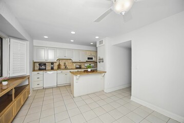 Bright and spacious home interiors featuring modern kitchen, cozy living room, elegant dining, updat