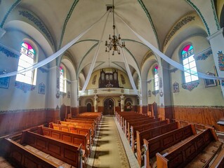Shot of the interior of the church in Zalipie village with colorful floral decorations