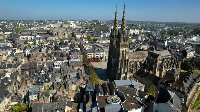 Quimper town - cultural heart of Brittany, France. Gothic Saint-Corentin Cathedral aerial drone view of old medieval city Finist&egrave;re department in the Brittany region, 4k hd video