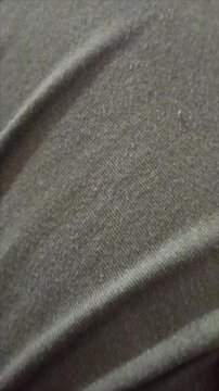 It emphasizes different textures, from soft and luxurious fabrics like silk to durable, wear-resistant material