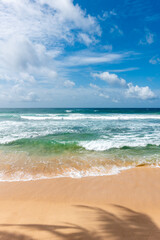 Scenic tropical beach view to horizon at Galle