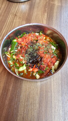 Kebab salad Turkish Gavurdagi with walnut. coban or choban salatasi