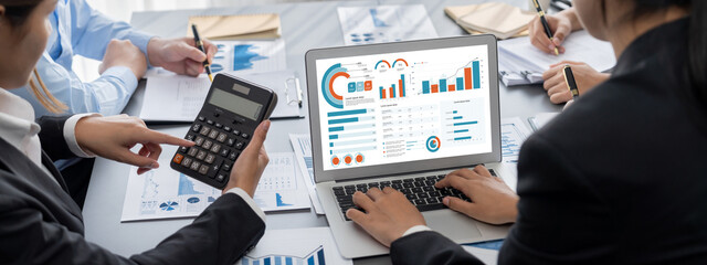 Business intelligence and data analysis concept. Analyst team working on financial data analysis...