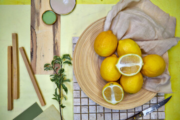 Color palette mood board in yellow tones with lemons and floral decoration
