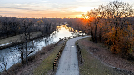 Obraz premium Pathway Along Canal At Sunset Overlook