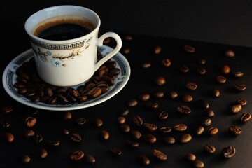 cup of coffee with beans