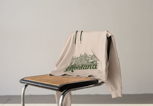 Stylish Mockup of a Casual Hoodie on a Chair