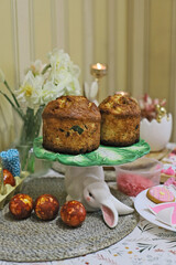 easter table with easter cakes, bunny and easter cake, festive background. holiday easter concept.