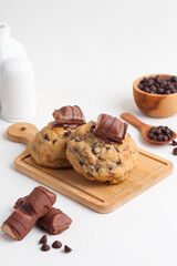 Chocolate soft cookies on a cooling rack on the table. perfect for recipe, article, or any commercial purposes.