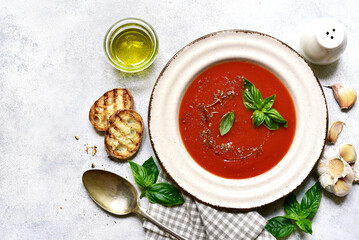 Gazpacho - cold spanish tomato soup with cucumber . Top view with copy space.