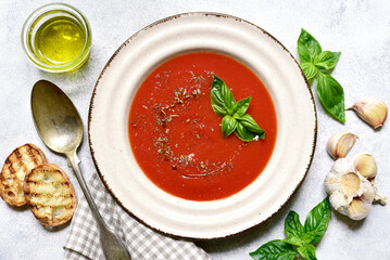 Gazpacho - cold spanish tomato soup with cucumber . Top view with copy space.