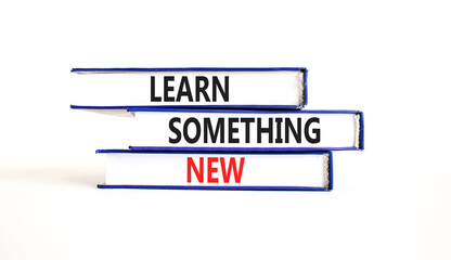 Learn something new symbol. Concept words Learn something new on beautiful books. Beautiful white paper background. Business motivational lifestyle learn something new concept. Copy space.
