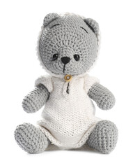 Cute knitted toy bear isolated on white