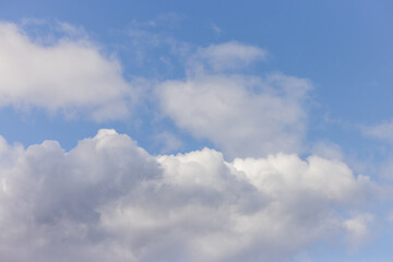 Fluffy White Clouds with Blue Sky Above Scenic BC, Canada