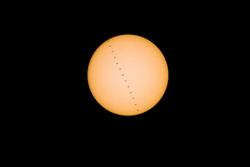 Transit of the International Space Station across the sun. Solar transit of the ISS satellite.