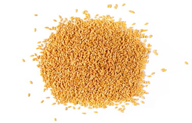 Organic golden flax seeds pile, linseed grains  isolated on white background, top view